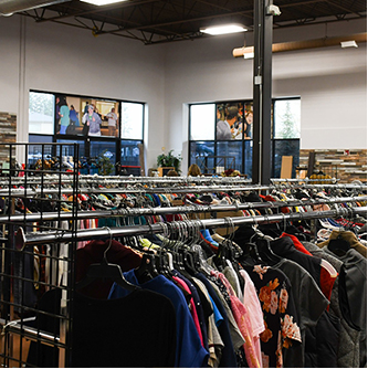 Image of clothing racks in The Arc Thrift Store